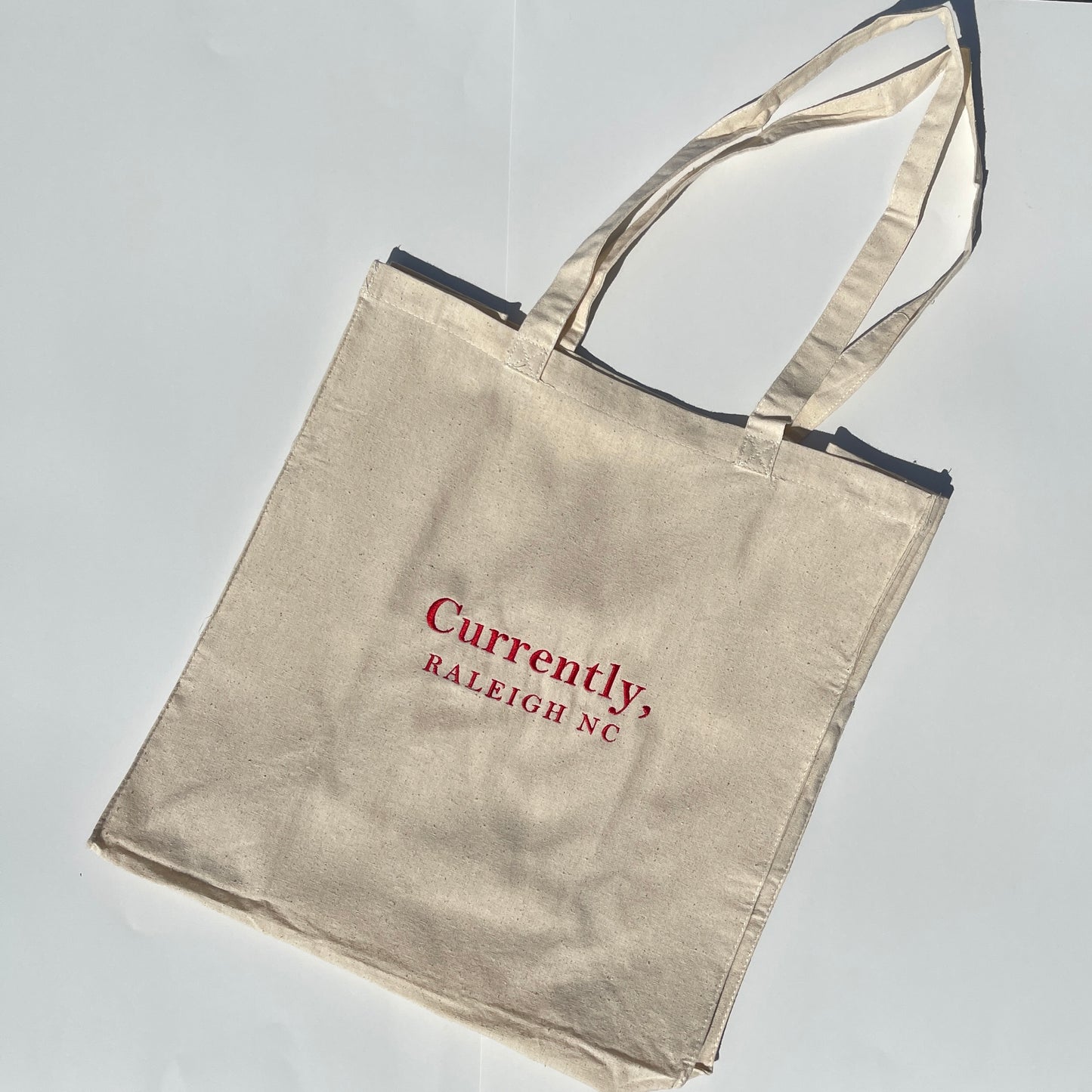 Currently, Cities Tote Bag