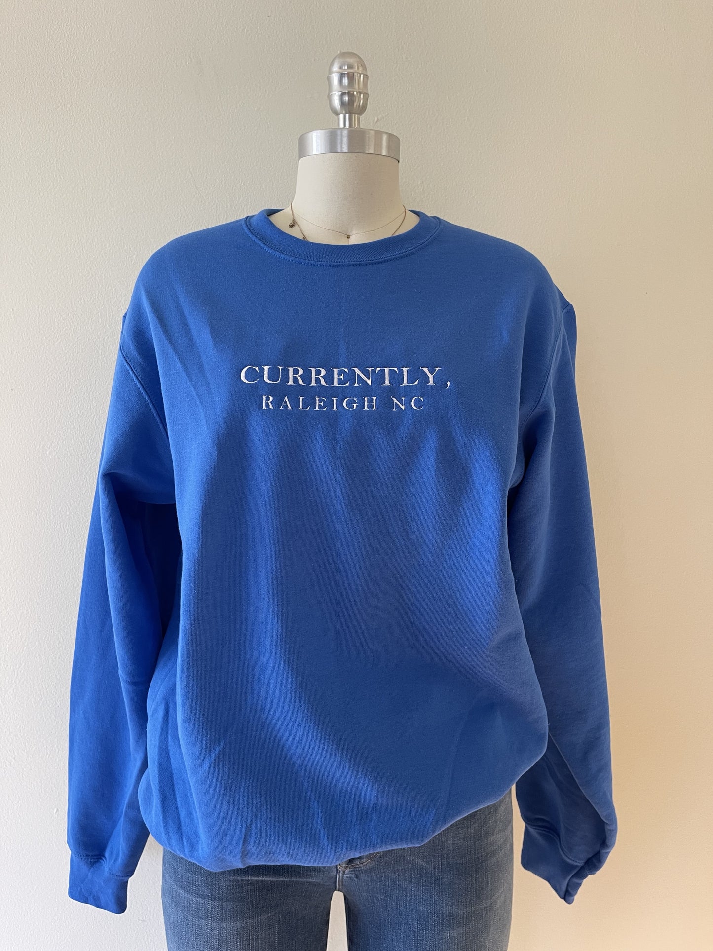 Currently Cities Embroidered Sweatshirt